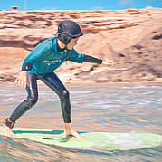 Children surfing in Fuerteventura