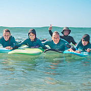 happy surfer family