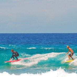 Fun surfing at the beach breaks in the summer in Fuerteventura