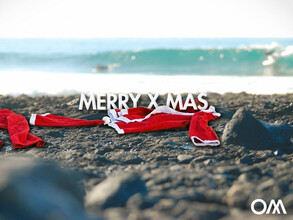 Santa also goes surfing