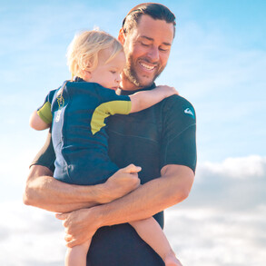 Surfer dad with son